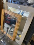 Two pine framed wall mirrors