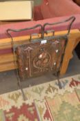 An Art Nouveau style copper fire screen