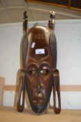 An African carved wall mask