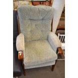 Wooden framed green upholstered easy chair