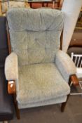 Wooden framed green upholstered easy chair