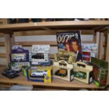 Collection of various boxed toy cars to include James Bond interest, London Taxis, vans etc