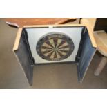 Wall mounted dart board with black painted frame