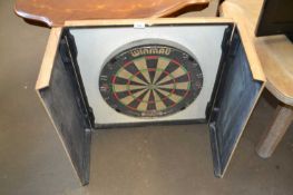 Wall mounted dart board with black painted frame