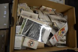 Quantity of assorted postcards and cigarette cards