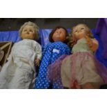 Three vintage composition bodied dolls