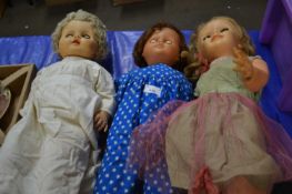 Three vintage composition bodied dolls