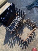 Two cast iron fire grates