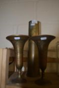 A pair of Indian brass vases together with a brass shell case