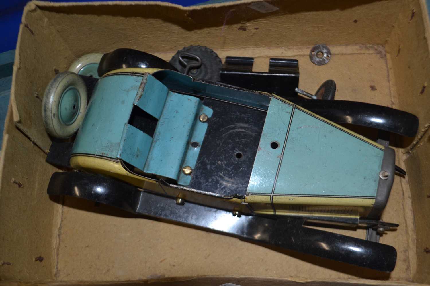 Metal clockwork toy car for restoration