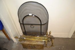 A brass covered coal box with fire iron, fire dogs and metal grate