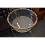Glass topped round bamboo and wicker conservatory table, approx 81cm diameter