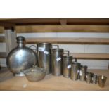 Mixed Lot: Graduated pewter measures together with further pewter flask and a miniature silver cup