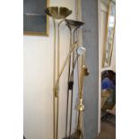 Two uplighters with adjustable lamps and a two light brass effect standard lamp (3)