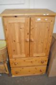 Pine tall boy with cupboards above, two drawers below, 73cm wide