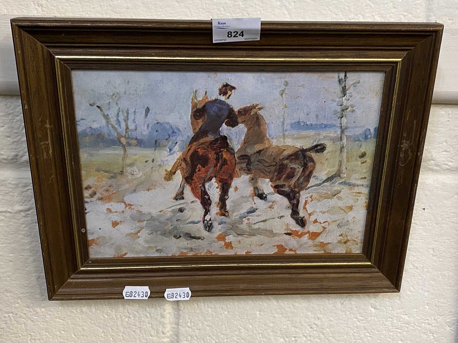 A reproduction impressionistic print of a rider and two horses, framed