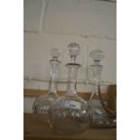 Three various clear glass decanters
