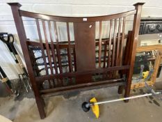 A Edwardian mahogany double bed frame with sprung base, approx 139cm wide