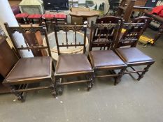 Set of four spindle back dining chairs with faux leather drop in seats