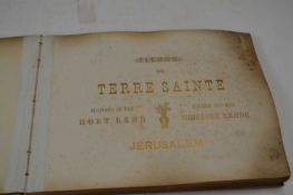 Book with views of Jerusalem and prints of various flowers of the Holy land in a wooden binding