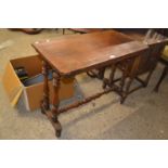 Late Victorian walnut veneered side table with turned stretcher, 86cm wide