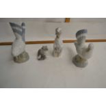 Lladro model of a cat and mouse together with a further Lladro model of a figure praying and two