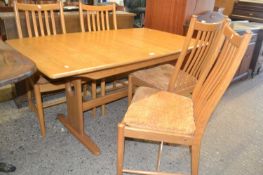 Modern Ercol dining table together with four chairs (5)