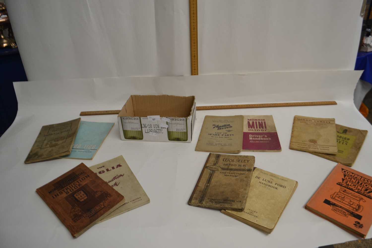 Box of vintage car instruction manuals to include Morris, Austin 7 etc