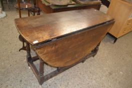 18th Century oak oval drop leaf dining table, 126cm wide