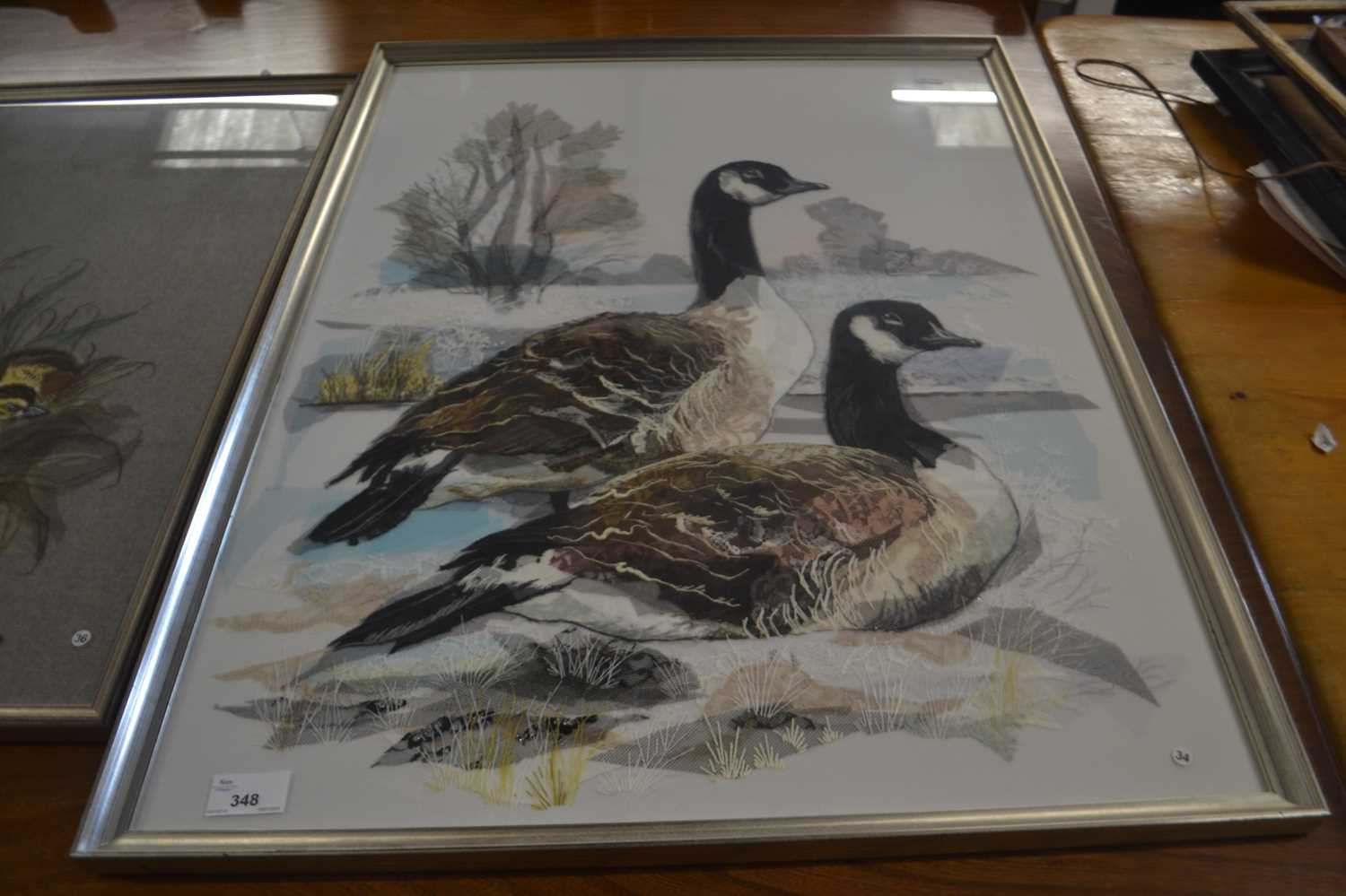 Unsigned needlework and gauze study of a winter scene with Canada Geese