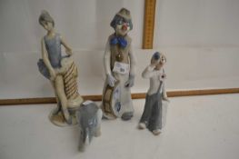 Group of four various Spanish ornaments to include clowns