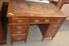 Late Victorian American walnut twin pedestal desk, 106cm wide