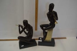 A pair of modern bronze effect figurines