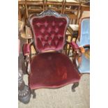 Victorian maroon upholstered button back armchair