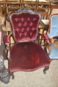 Victorian maroon upholstered button back armchair