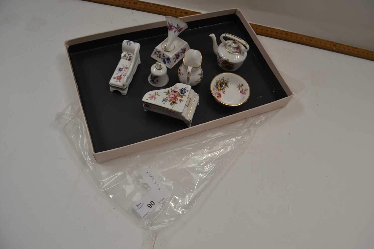 Collection of Hammerslea miniature porcelain items to include jugs, bells, miniature piano etc