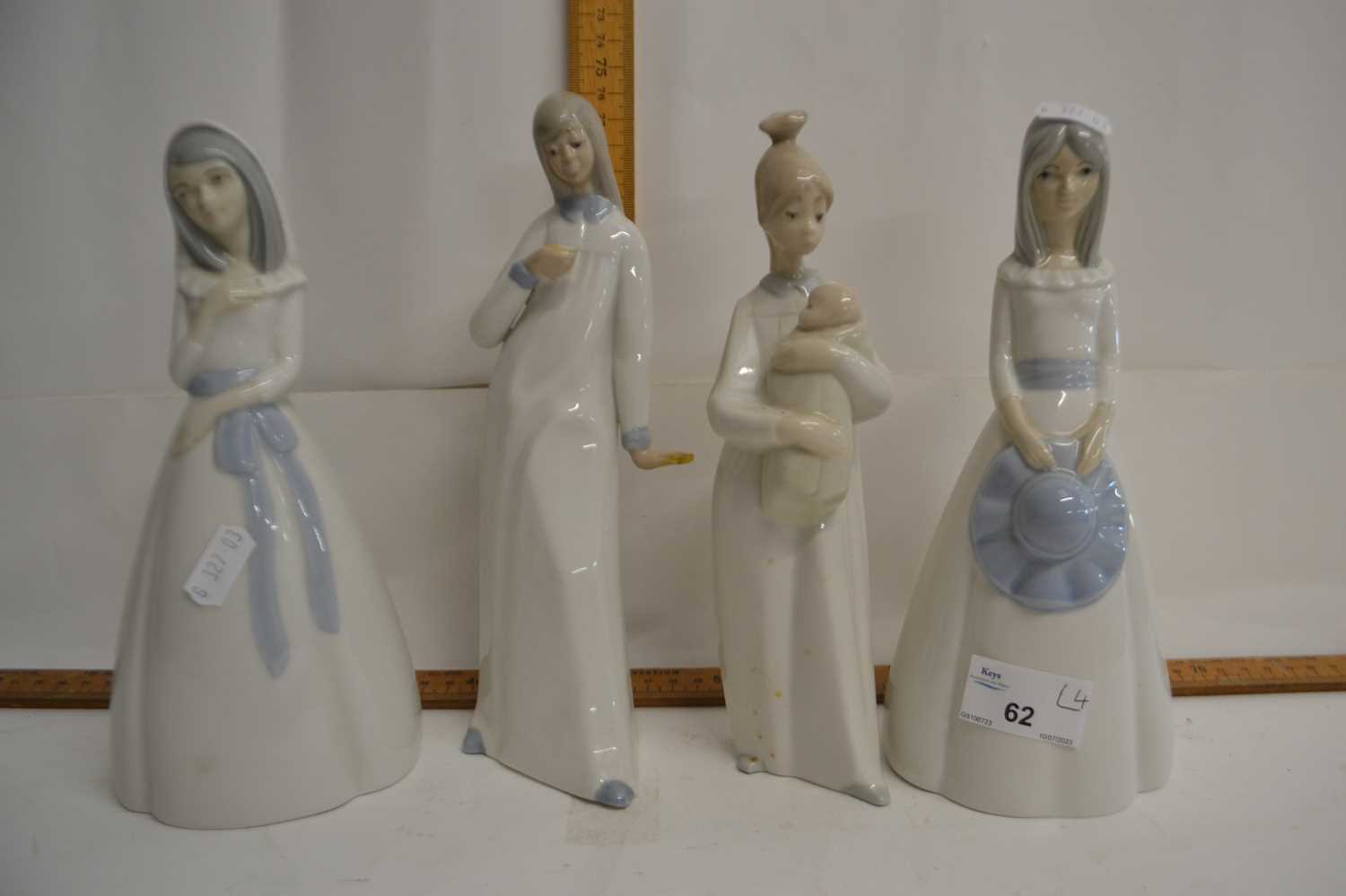 Four various Spanish figurines in the Lladro style