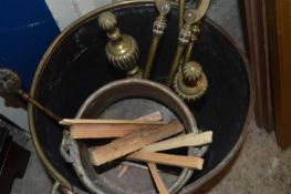 Copper coal bucket together with a selection of various brass fire tools