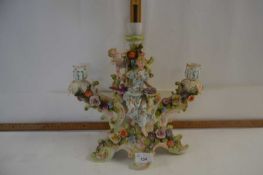 Continental figural and floral encrusted three branch candelabra converted to a table lamp