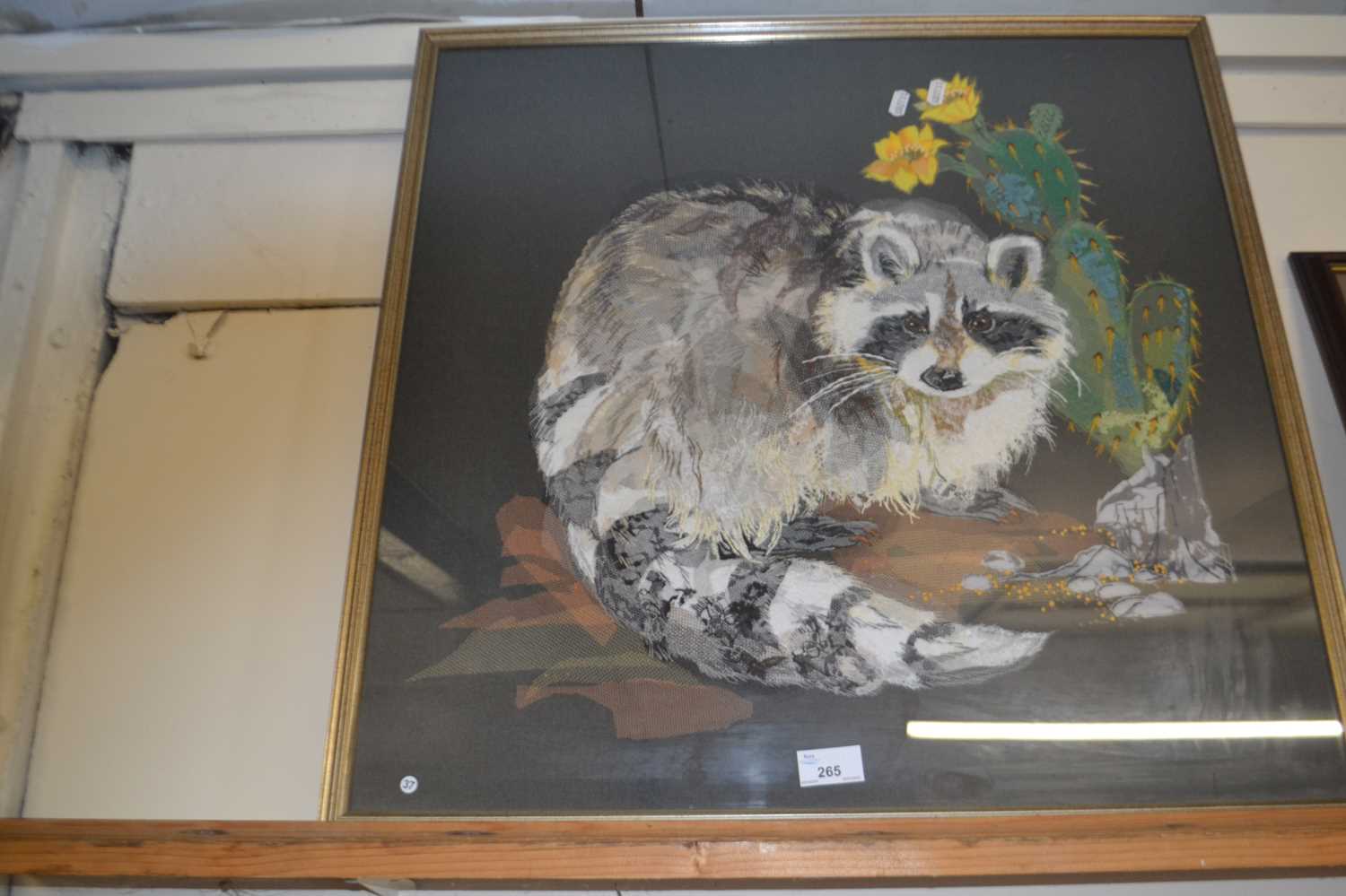 Contemporary needlework and gauze picture of a racoon, framed and glazed