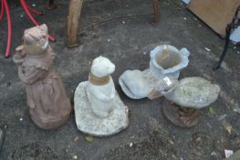 Four garden ornaments to include a boot planter, goose and two others