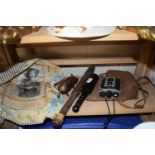 Mixed Lot: Decorated cushion cover, wooden truncheons, brass piggy bank and a vintage Kodak camera