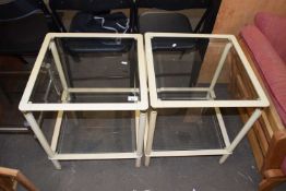 Pair of two tier cream framed glass square side tables