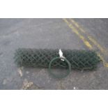 Roll of green wire garden fencing