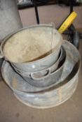 Four galvanised buckets of varying shapes and sizes