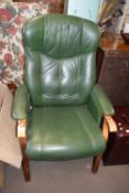 Wooden framed green upholstered easy chair