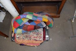 Quantity of assorted multi-coloured rugs