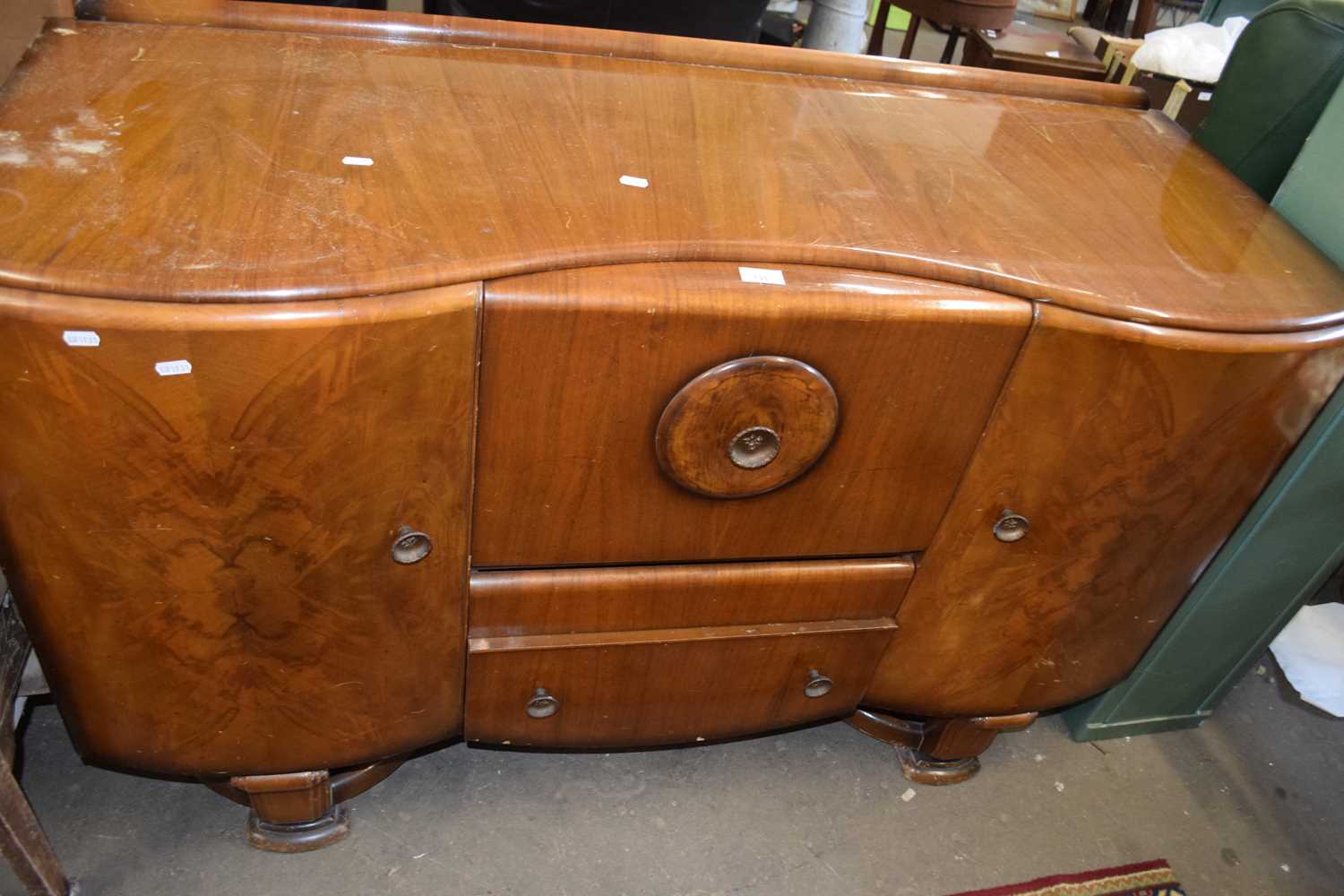 Mid 20th Century sideboard with drop leaf centre section, cupboards to either side and drawer below