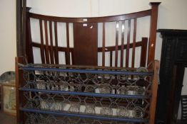 A Edwardian mahogany double bed frame with sprung base, approx 139cm wide