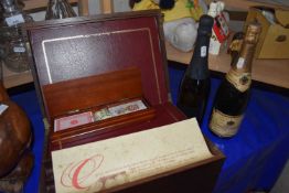 Mixed Lot: Two bottles of champagne, a Remy Martin Cognac promotional writing box together with